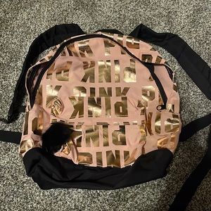 Pink and black backpack
